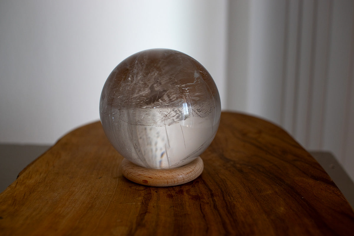 Healing crystal ball made of clear quartz for meditation and balance