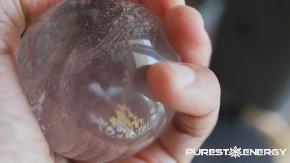 Healing crystal ball made of clear quartz for meditation and balance